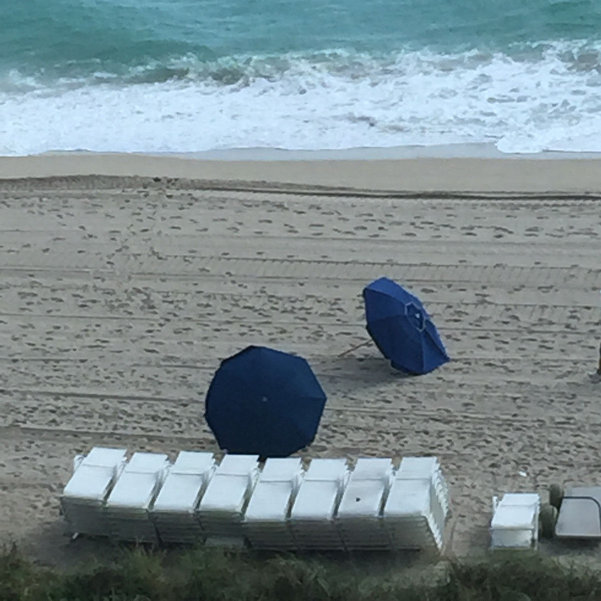 Umbrellas Blowing in the Wind by Gina Godfrey 