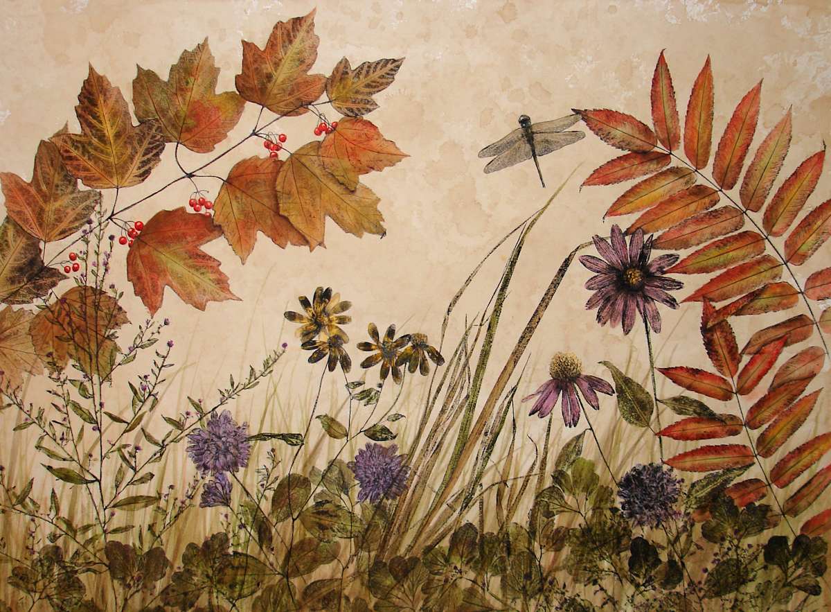 Dragonfly, Rising by Vickie Schumacher  Image: “This is part of a series of fall South Dakota plants. This nature print contains American cranberry, mums, yellow coneflower, purple coneflower, and sumac inked then pressed into a surface to create a transferred image. We are fortunate here in South Dakota to enjoy the fabulous colors in sumac, one of my favorite plants to print. As in my other nature prints, this piece was printed using oil-based ink, with a color wash of acrylic paint added afterwards. The paper is stained to give the illusion of an aged botanical print.”