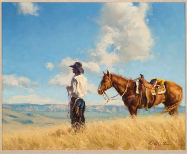 WHERE THE HEART IS by Bill Anton  Image: Horizontal, landscape with the cowboy standing in the knee high grass gazing over the wide open landscape, blue sky with puffy clouds, his horse to the right.
