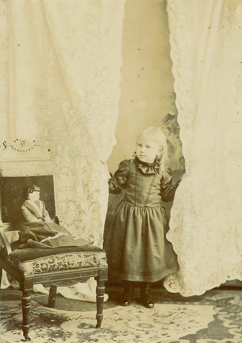 Girl with Doll by W.L. or Ada A. Gowe, Image 1.