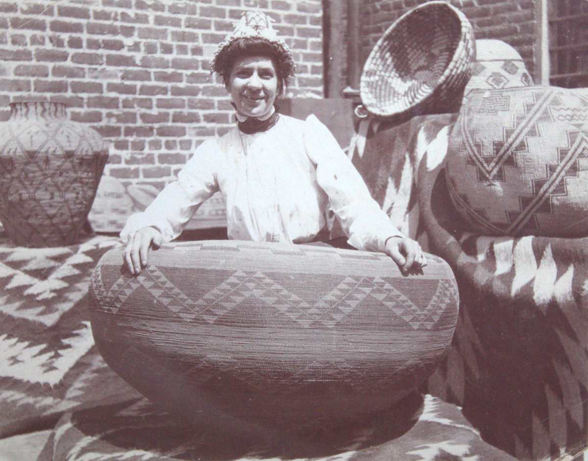 Woman among Baskets by Unknown, United States, Image 1.