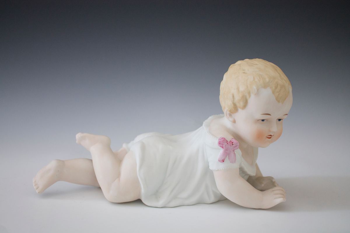 Piano Baby by Gebrüder Heubach, Image 1.