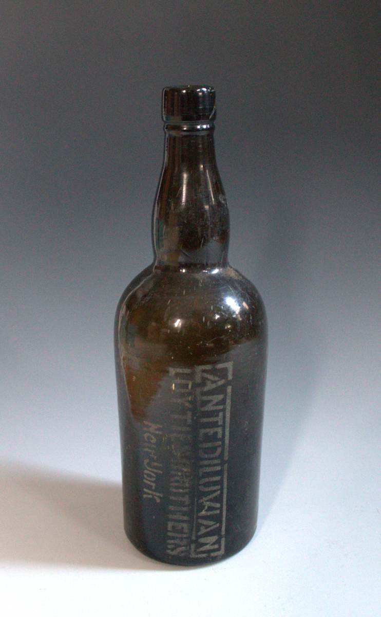 Whiskey Bottle by Luyties Brothers, Image 1.