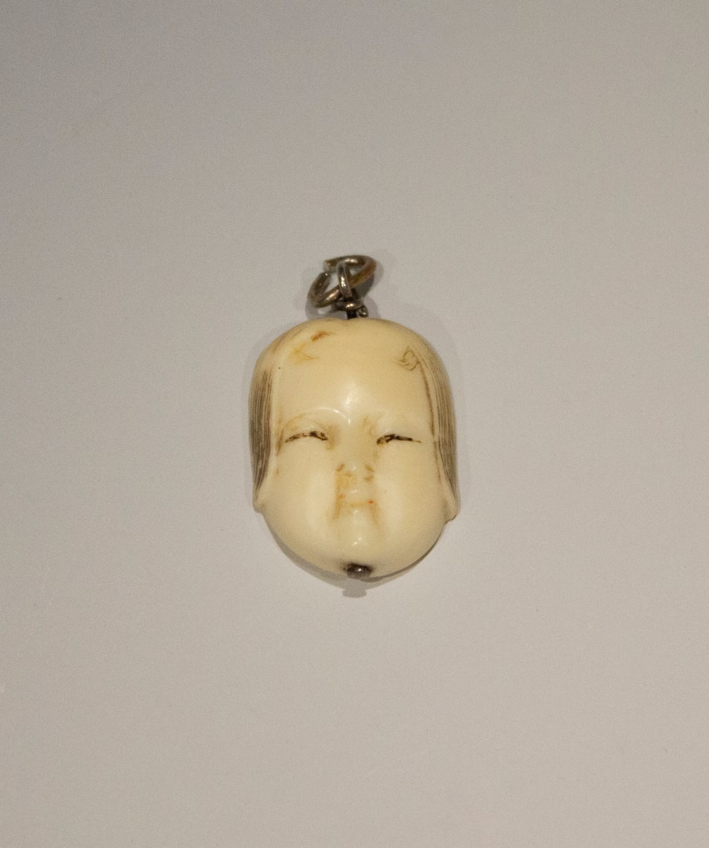 Charm by Kōmin, Image 1.