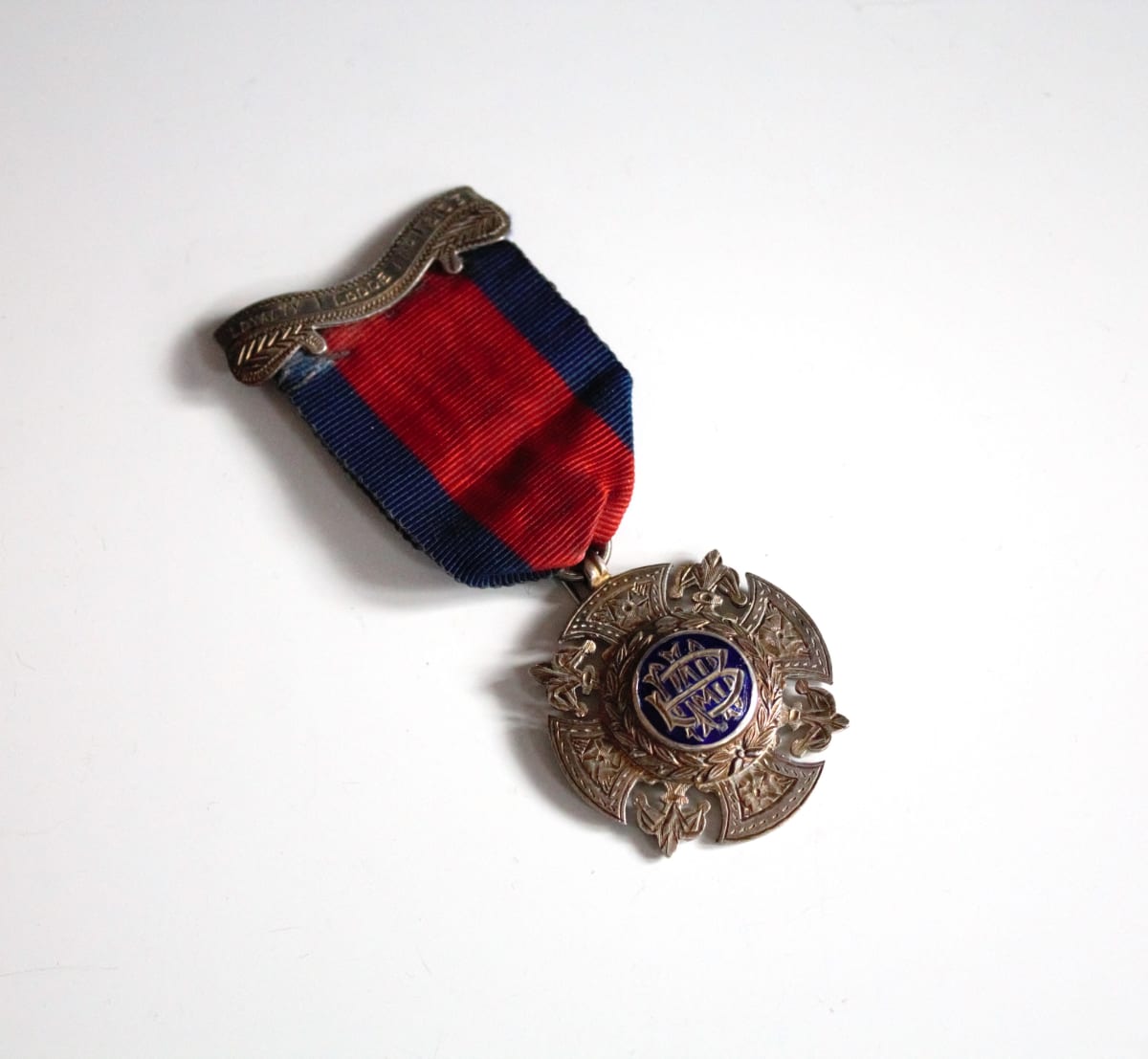 Medal by L. Simpson & Co. 