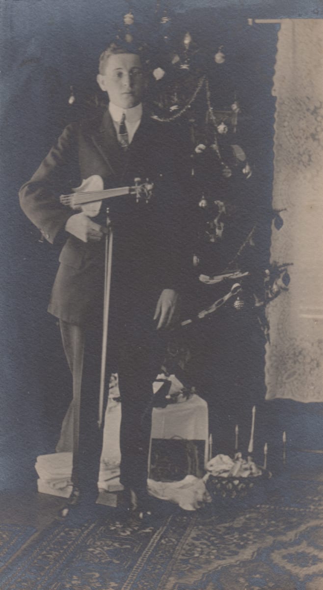 Violinist at Christmas by Unknown, United States, Image 1.