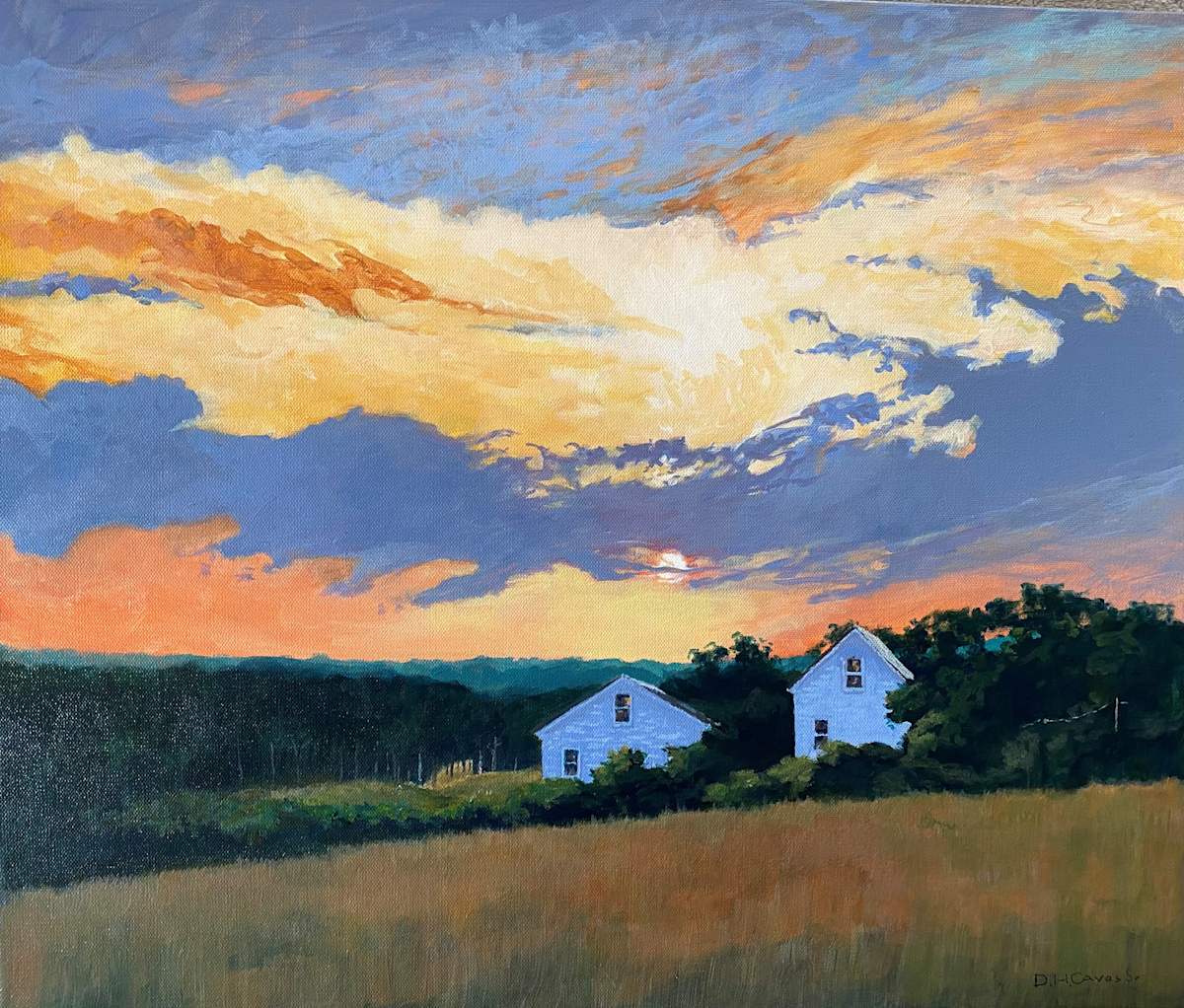 Sunset Serenade on a Gentle Hill by Douglas H Caves Sr  Image: The artwork is a landscape painting showcasing a pastoral scene during a vibrant sunset. It features two white houses nestled among lush green trees, situated on a gentle hillside. The sky is a dramatic display of colors, with rich shades of orange, yellow, and blue, marked by wispy clouds. The lighting creates a warm, serene ambiance across the countryside.