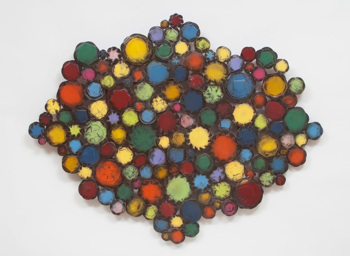 Confectioner's Cloud by Susan Madacsi  Image: This wall sculpture is a floating cloud of color created from many expertly hand-forged steel disks detailing a wonderful variety of textures, patterns, and colors. Artist Susan Madacsi merges her long time interest in street art in her inspirational use of aerosol enamel paints in her work. Each piece is unique; exact colors and arrangement of elements will vary.
Artwork is made to order. 