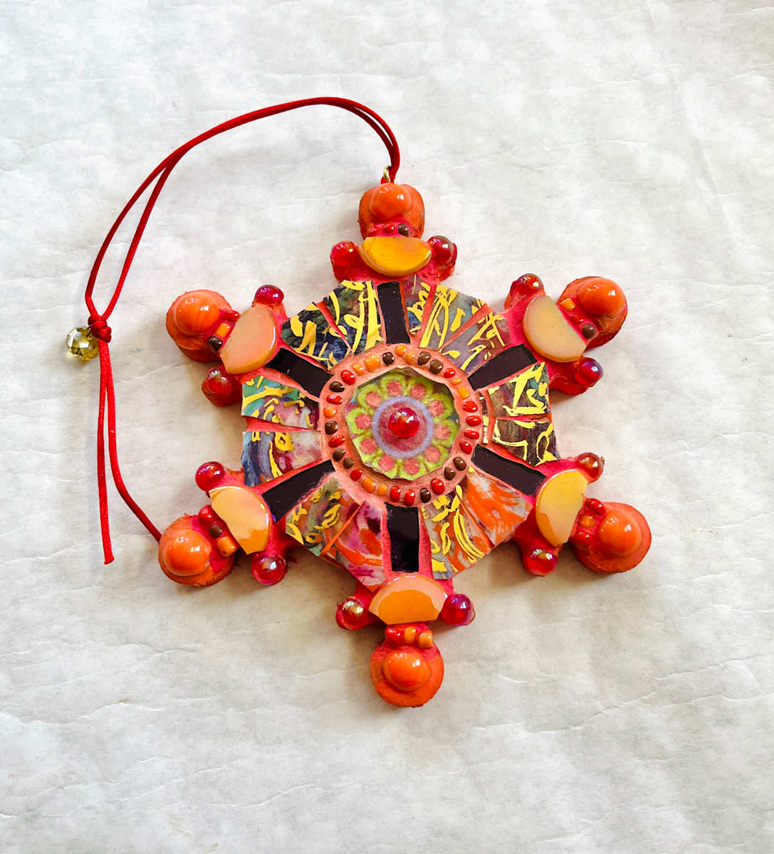 Orange Snowflake by Corinne McKeown 