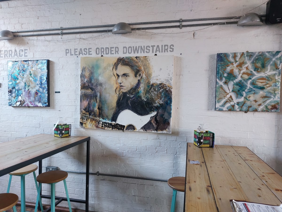 6) paintings at Mad Squirrel bar by Robin Eckardt 