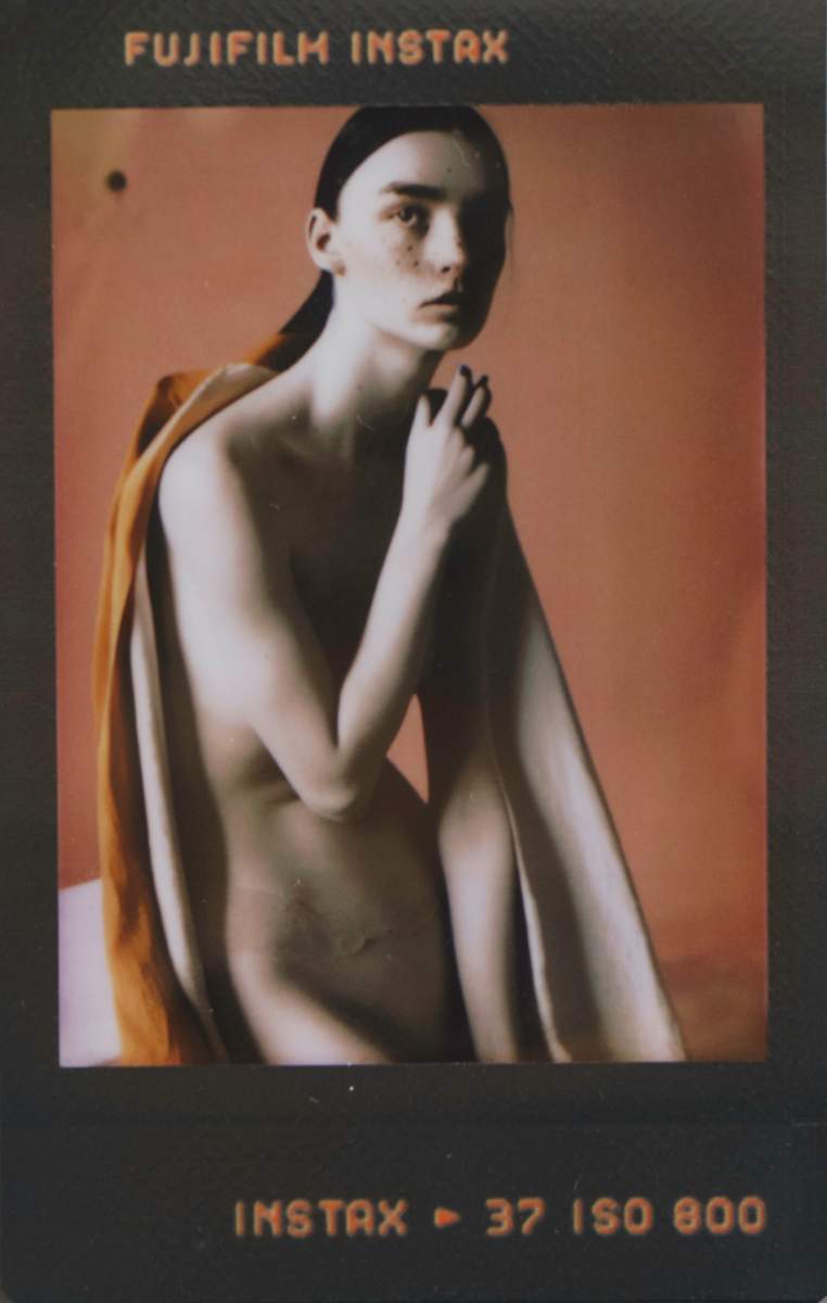 Between Poses / Render Lag by Maria Lankina  Image: A figure caught between two gestures, as if the system hasn’t decided which pose to render.