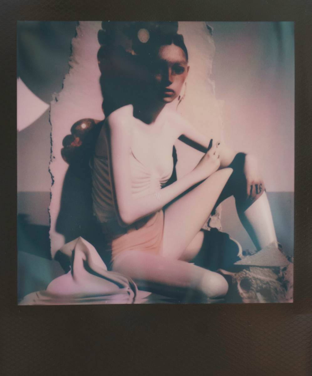 Reluctant Muse / System Lag by Maria Lankina  Image: A half turned figure slips out of alignment, like a muse the system tries to render but cannot hold steady.