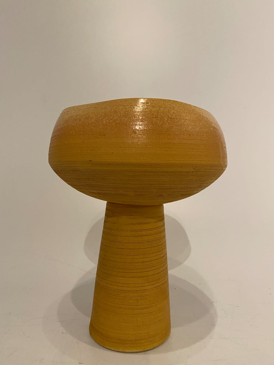 Orange ceramic ikebana vase with incised lines 