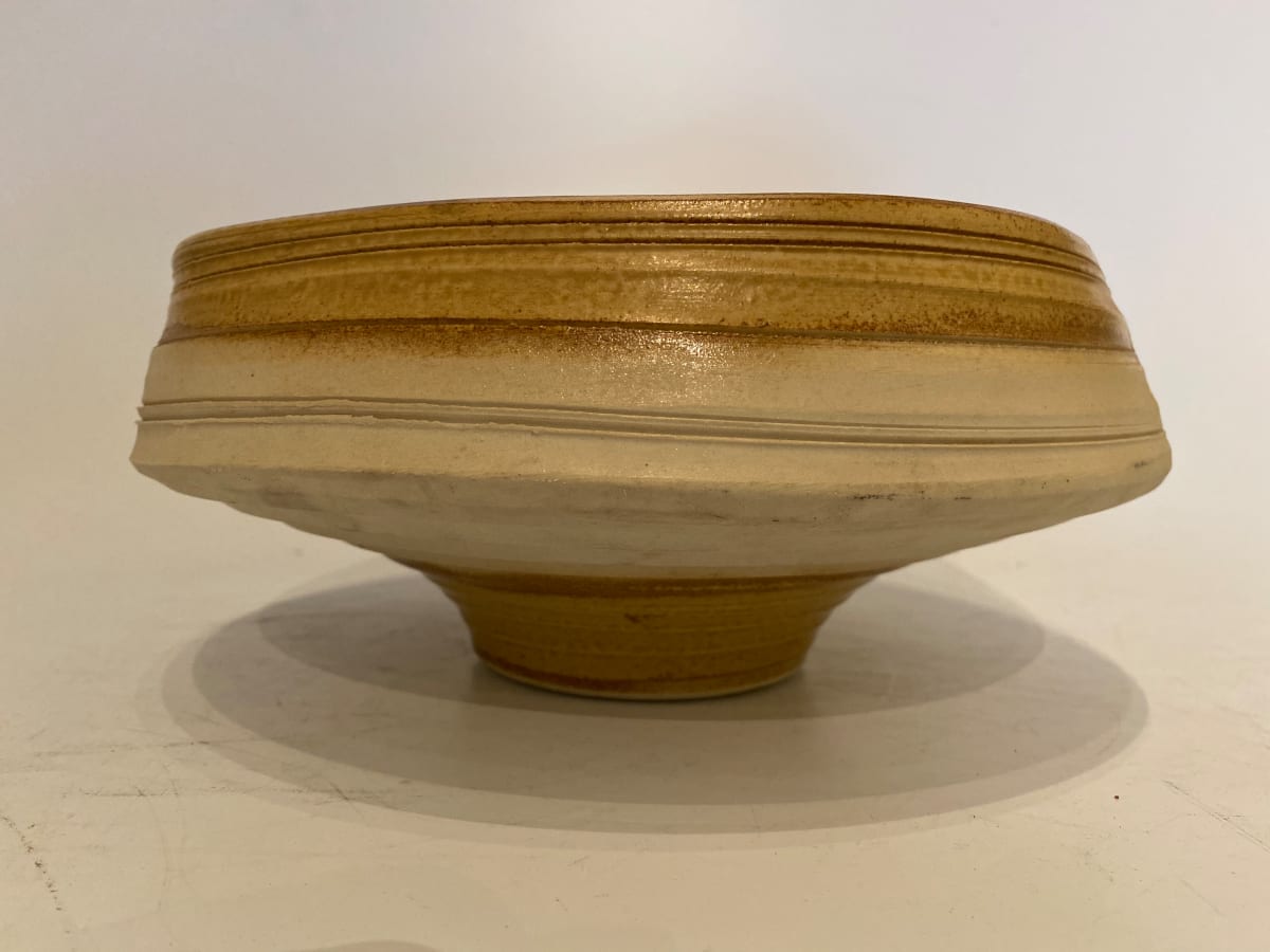 Shallow ceramic ikebana vase on a footed base. 