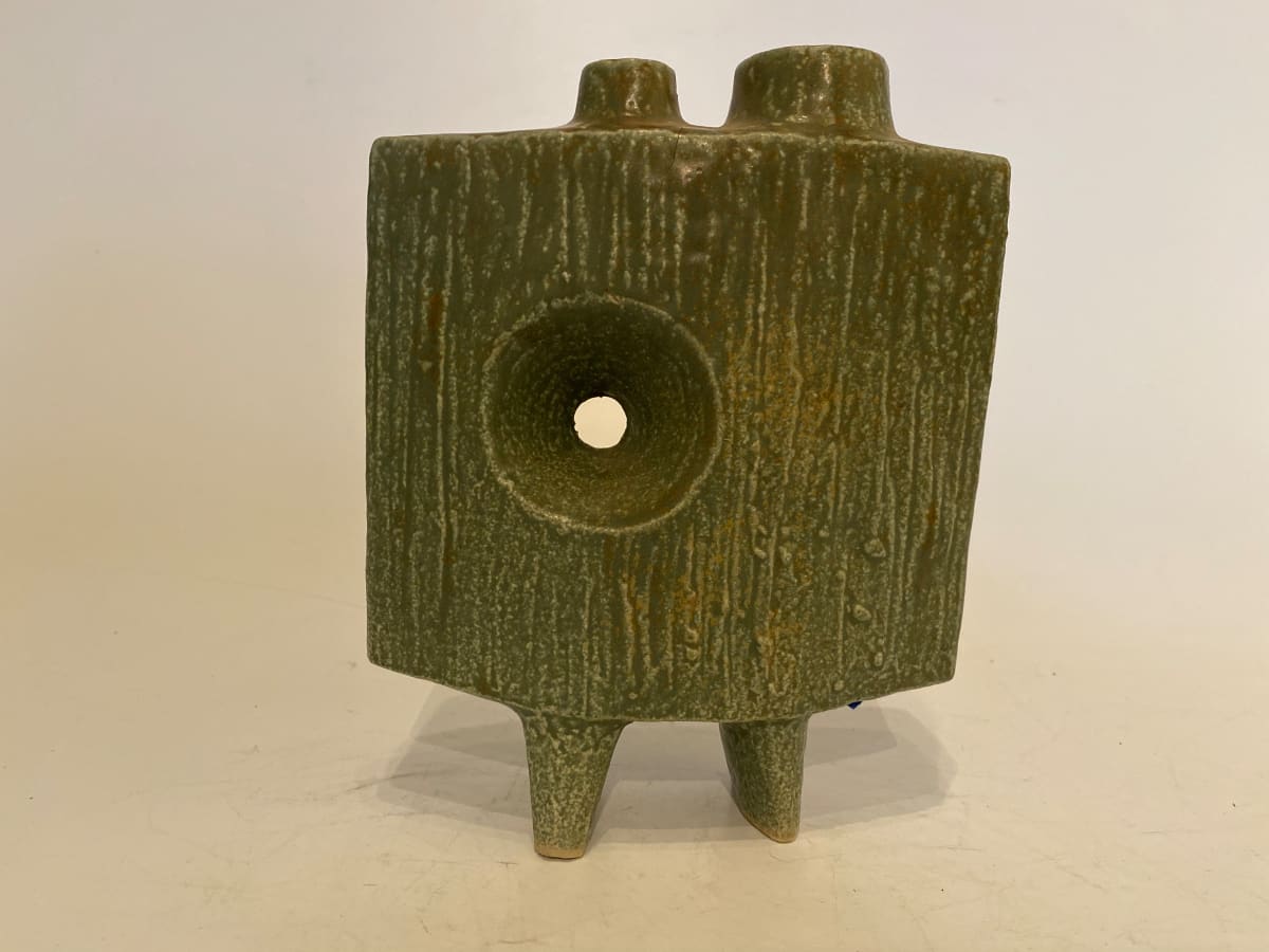 Green ceramic ikebana vase with round cutout 