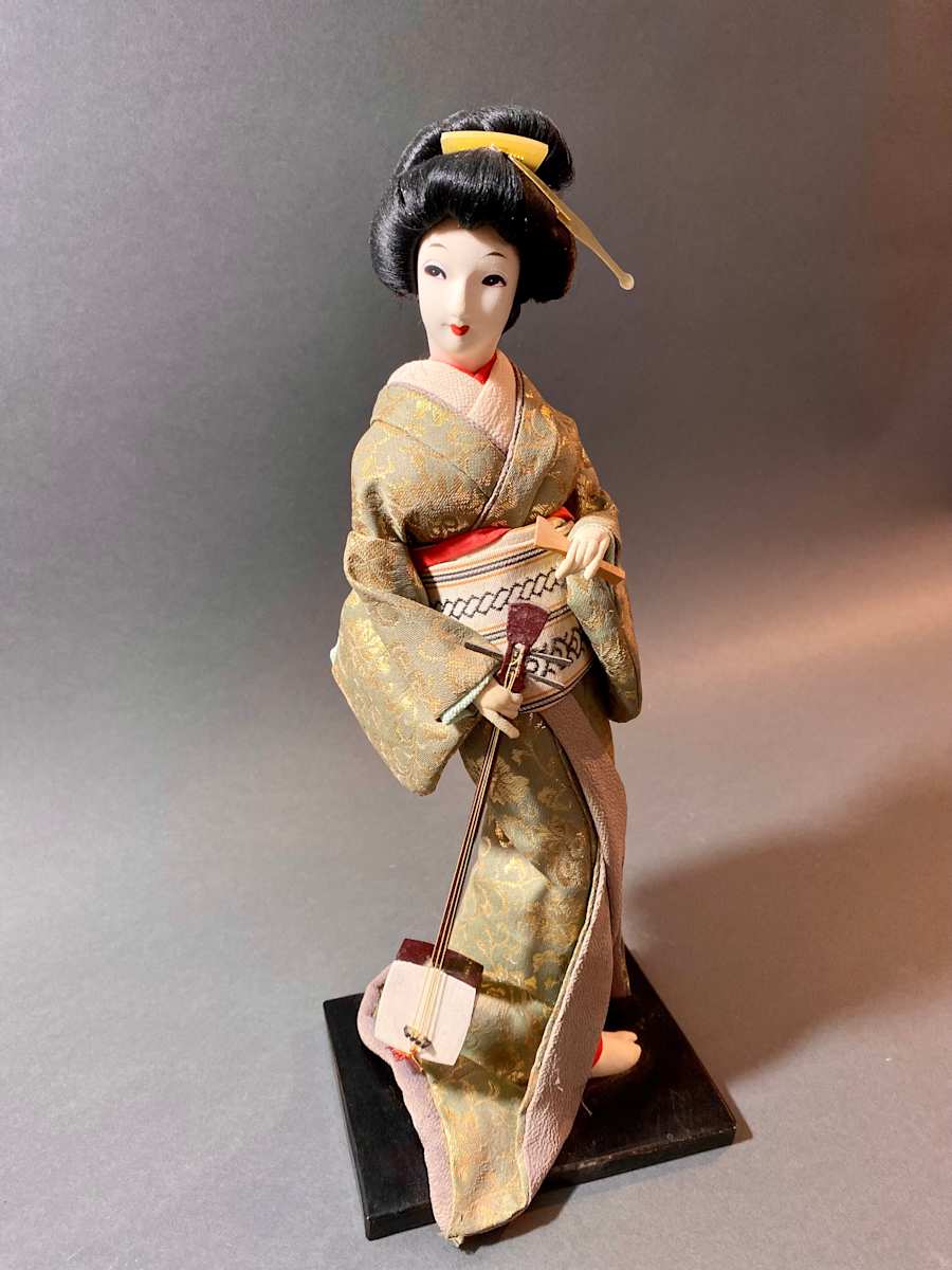 Geisha doll with shamisen 