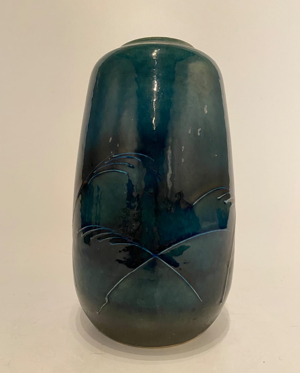 Teal ikebana vase with leaves 