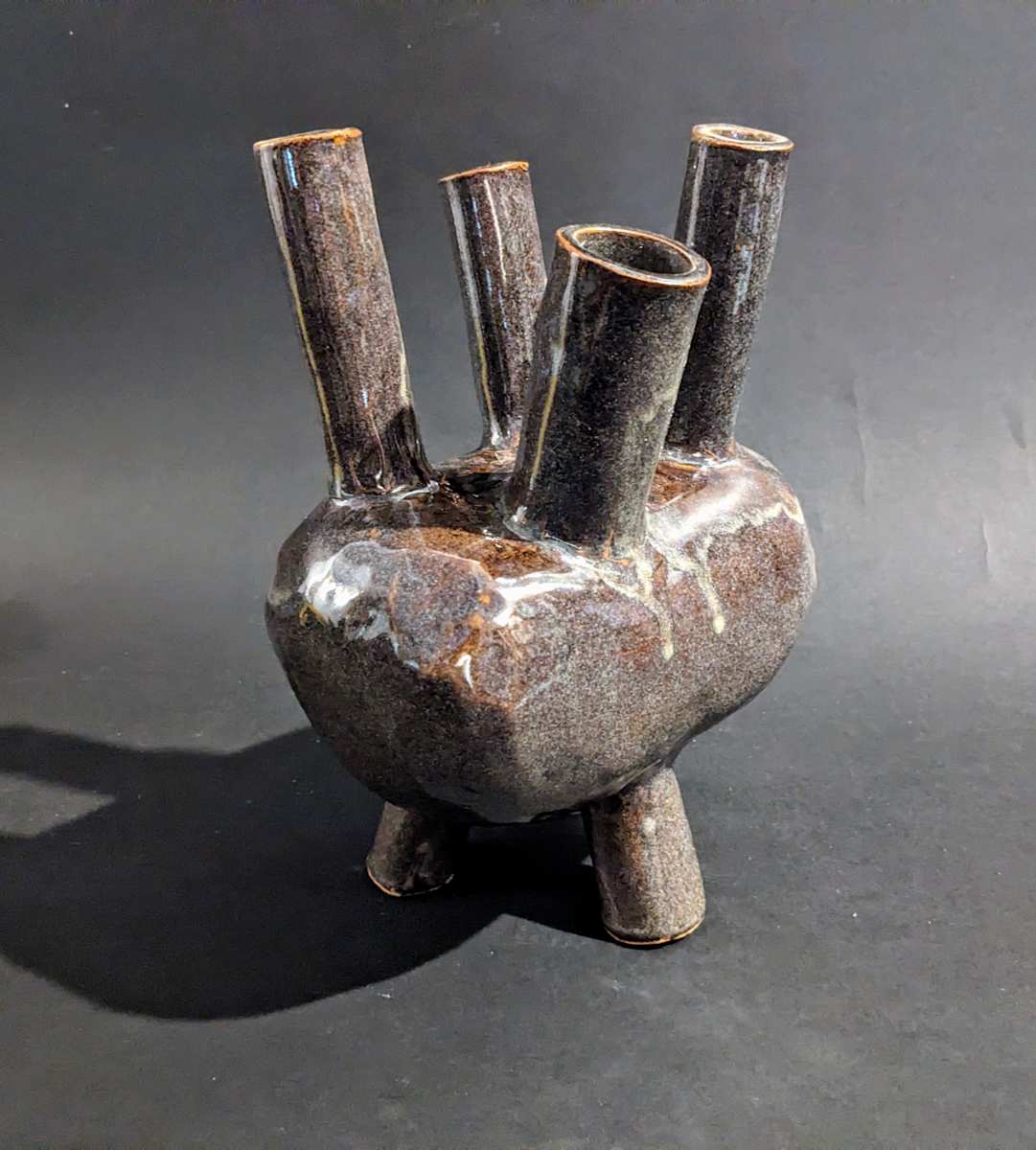Ceramic ikebana vase with four spouts 