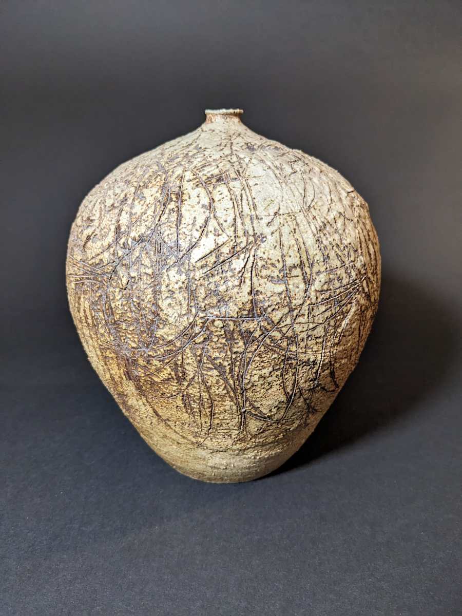 Globular ceramic ikebana vase 
