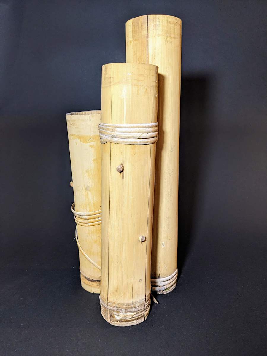 Cluster of three bamboo ikebana vases 