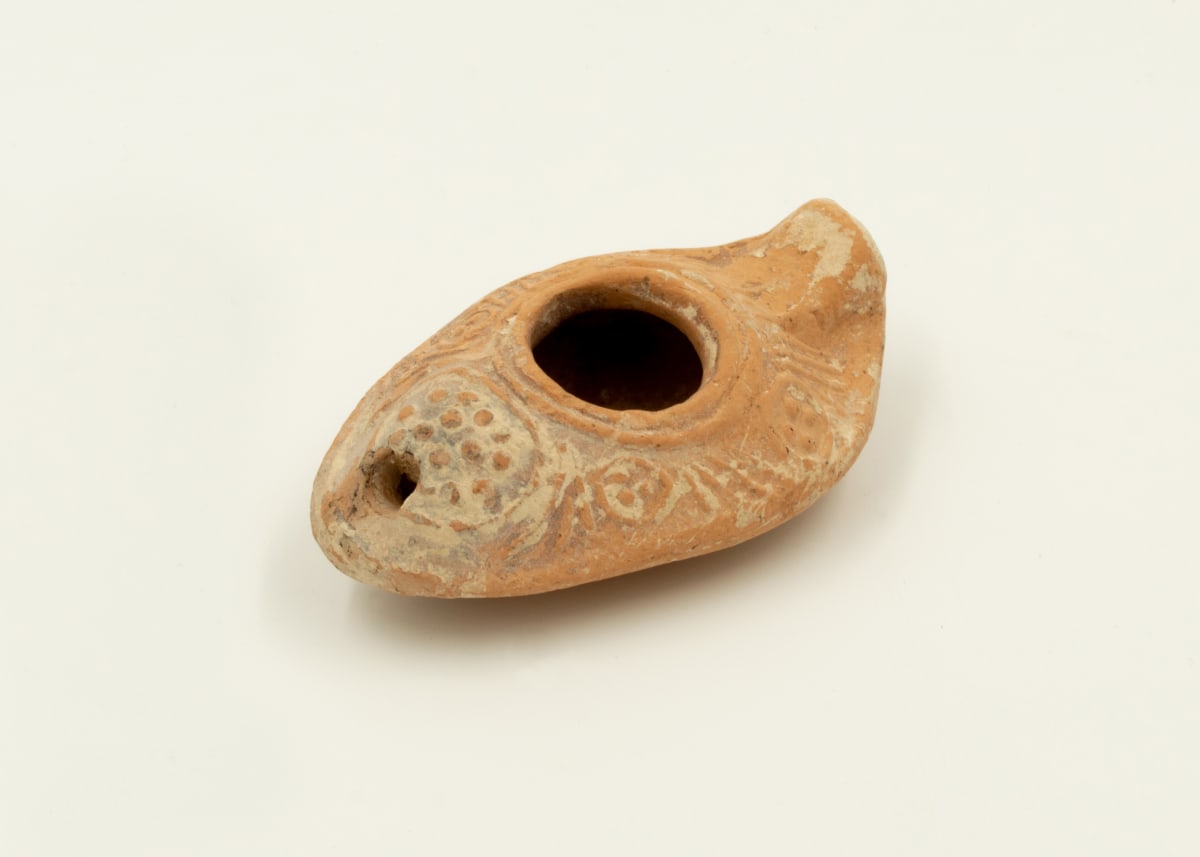 Terracotta oil lamp by Unknown 