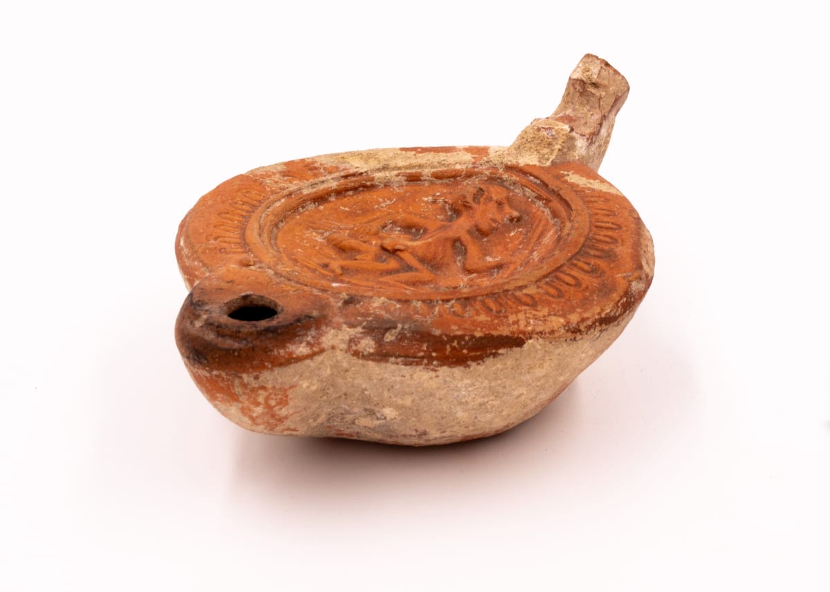 Roman oil lamp by Unknown 