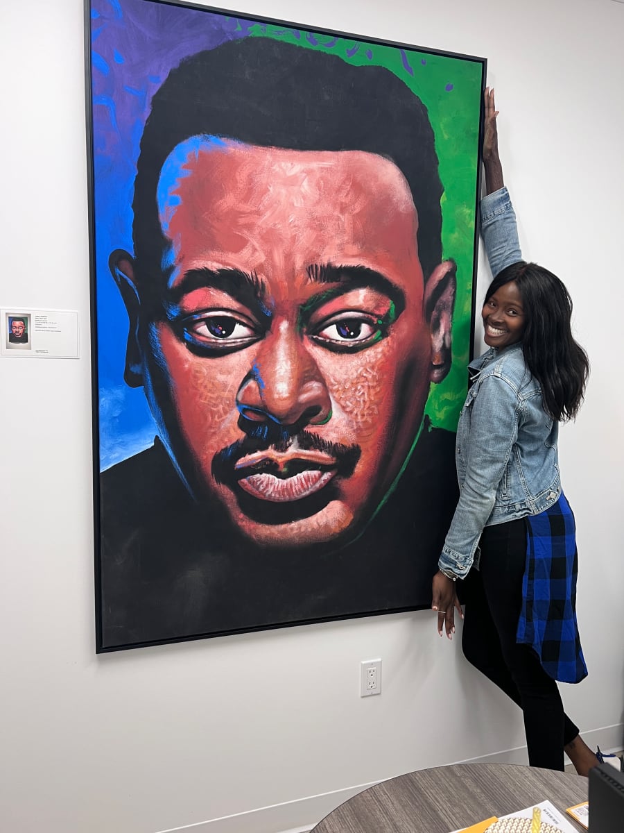 Luther Vandross by Walt Wali Neil  Image: artHYPE Board Member Kymberli Hall with Walt Wali Neil's Luther Vandross, framed by Square Deal Framing, Valley Village