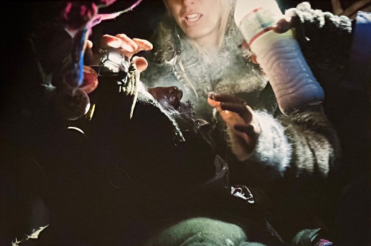 Medic treating tear gas victim, Nov 20, 2016, during 10 hour Backwater Bridge Battle. by Jon Willis 