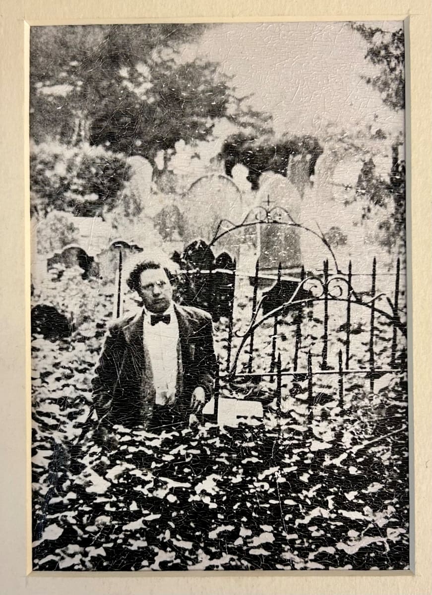 A shot of Dylan Thomas standing in the plot where he's buried by Sarah Walters 