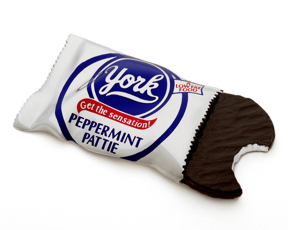 YORK PEPPERMINT PATTIE by Robin Antar  Image: CARVED OUT OF STONE AND THEN CAST IN STAINLESS STEEL. THE LOGO IS SAND-BLASTED, THE PAINT IS AIR BRUSHED.
