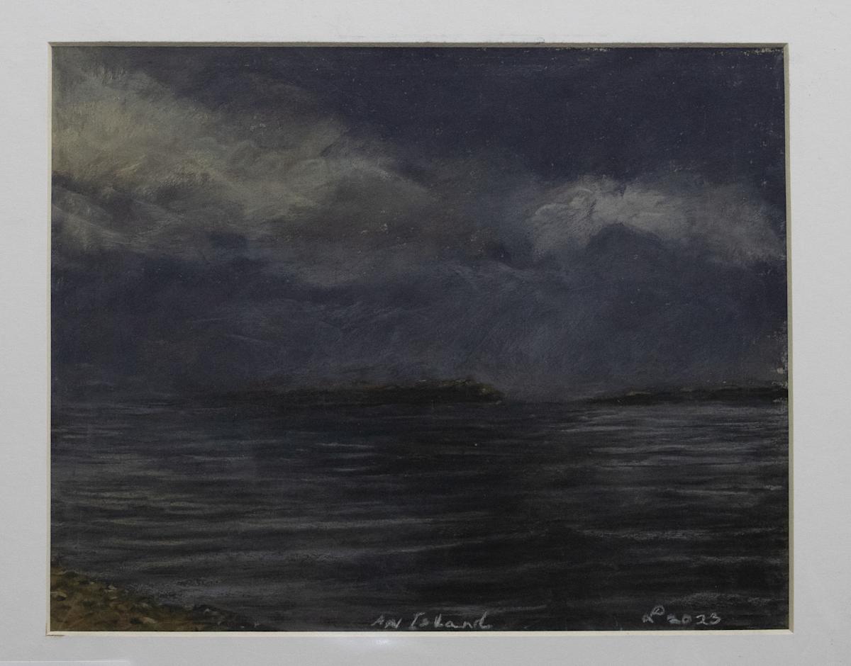 An Island by Don Leverich  Image: An island pokes through the dusky gloom as a storm approaches.