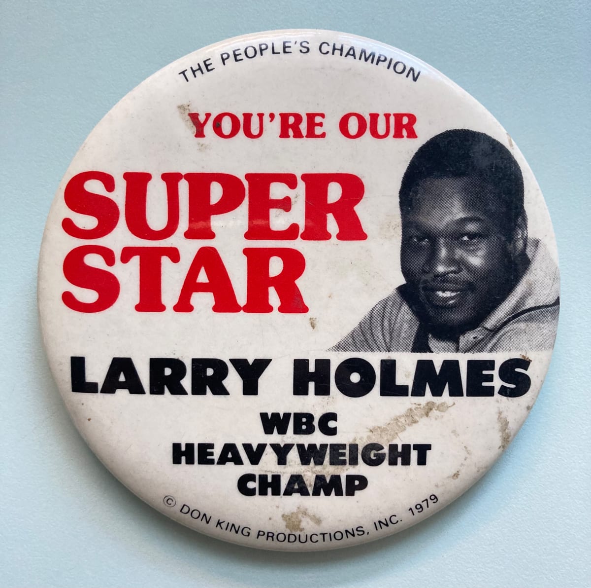 Larry Holmes button by Don King Productions 