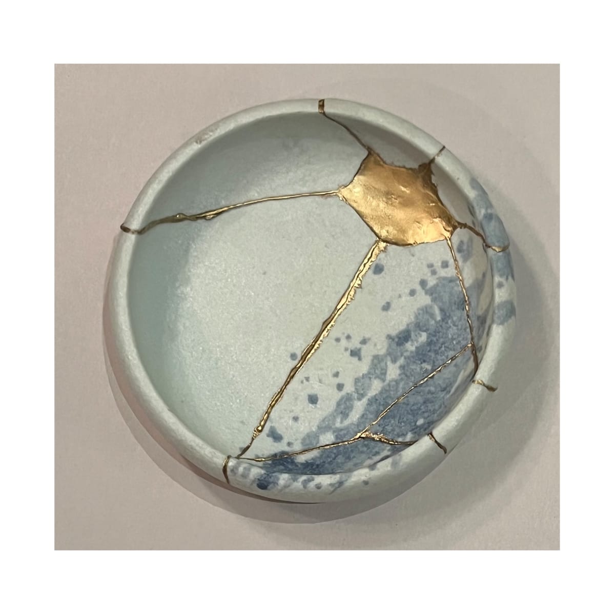 Kintsugi Pottery by Kurt Caddy 