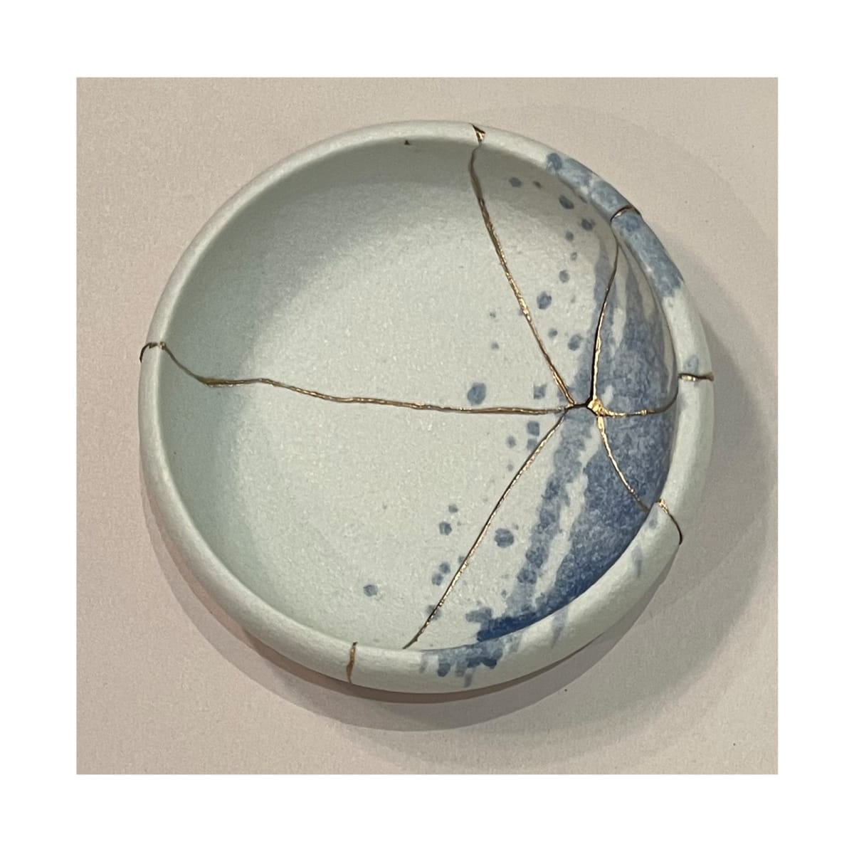 Kintsugi Pottery by Kurt Caddy 