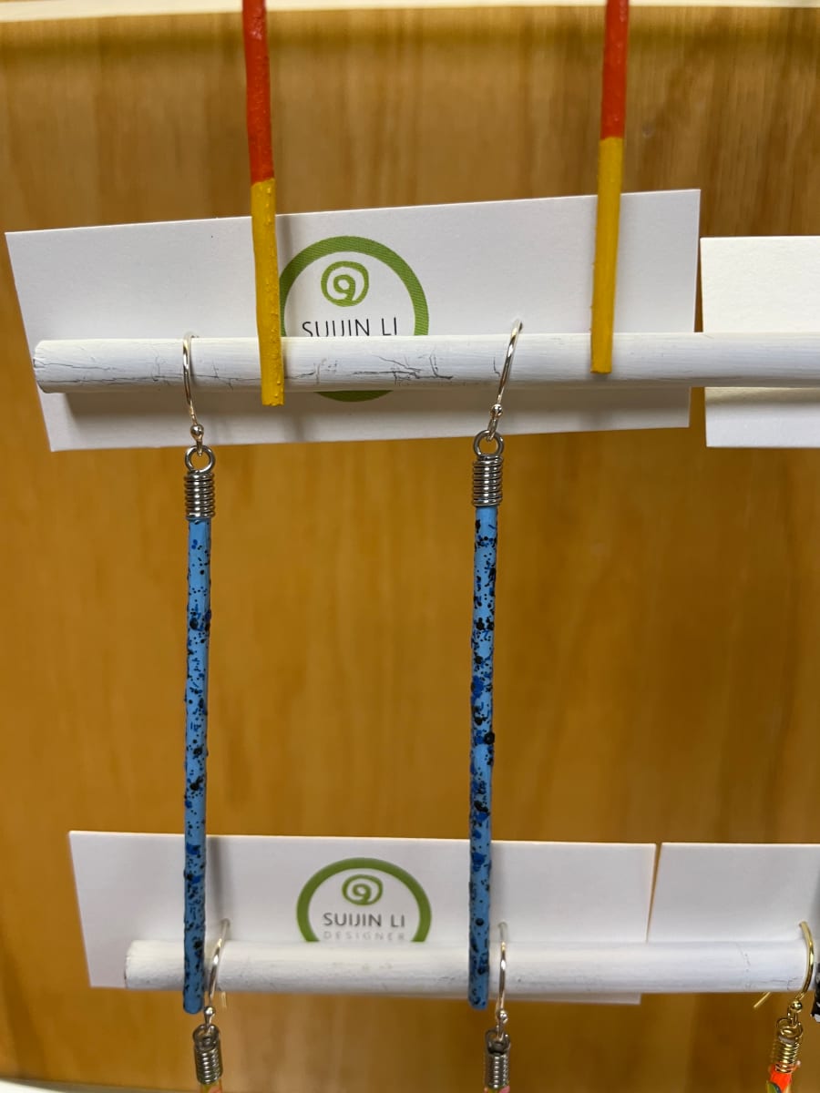 Blue speckled stick earrings by Suijin Li 
