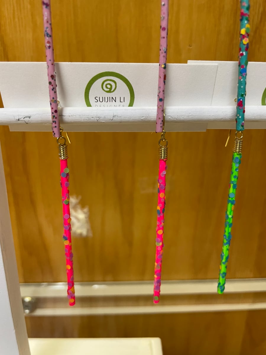 Neon Pink speckled stick earrings by Suijin Li 