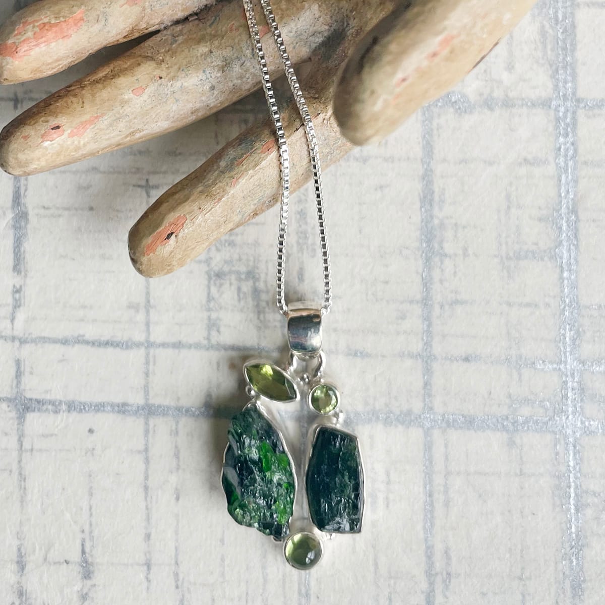 peridot and raw emerald necklace by Kayte Price 