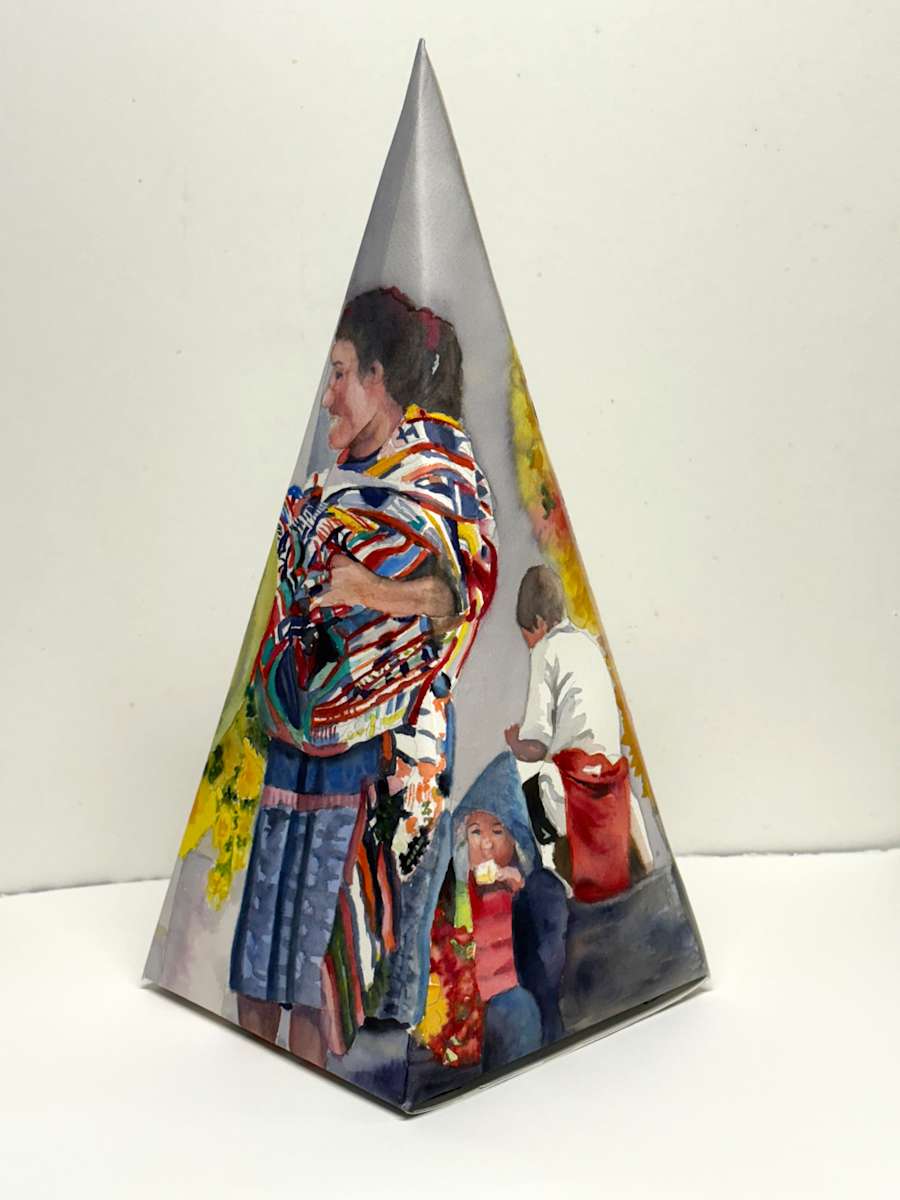 Friends and Family by April Rimpo  Image: Pyramid shaped watercolor 3-D Sculpture, where you can see a woman carrying fabric and a man working in the background.