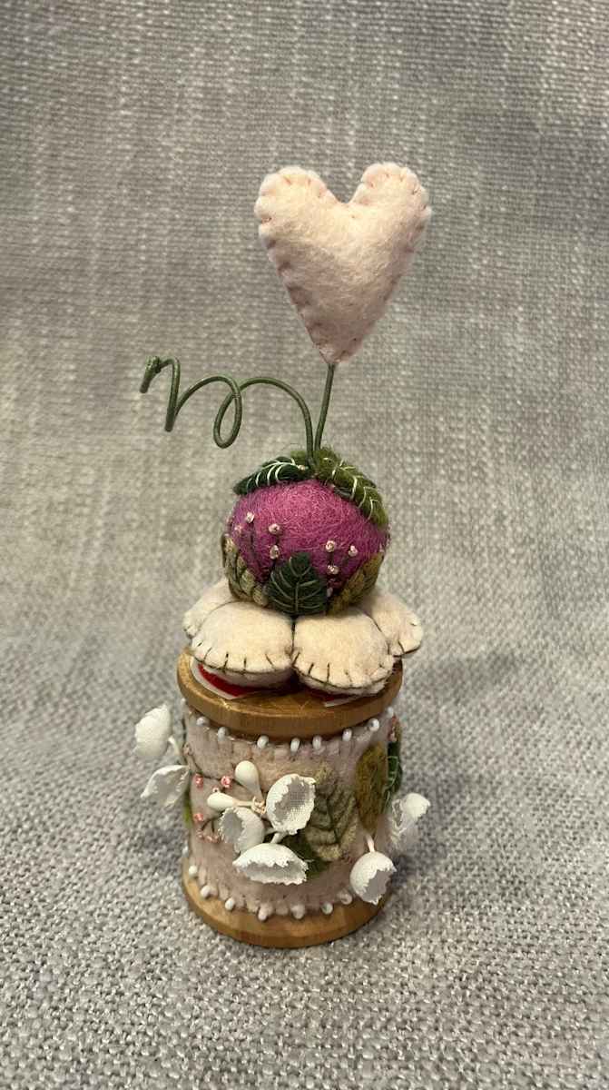 Pink and white Vintage Flower Wooden Spool by Christine Shively Benjamin  Image: Full front view