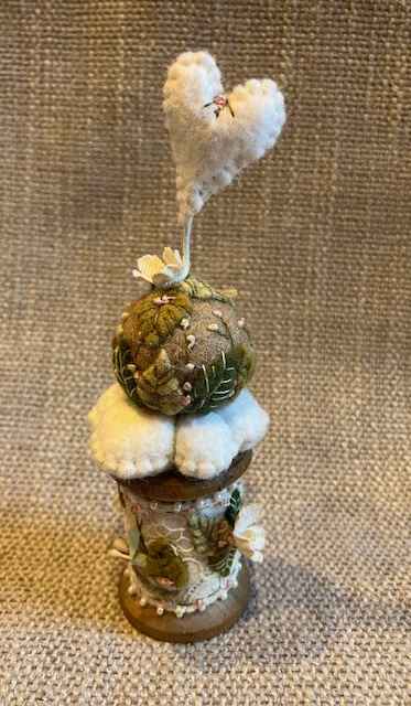 Lily of the Valley and White Heart Wooden Spool by Christine Shively Benjamin  Image: Front view