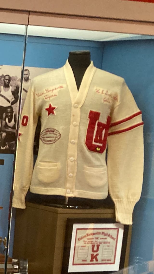 Letterman Sweater by Fine's Men's Shops  Image: Sweater on display
