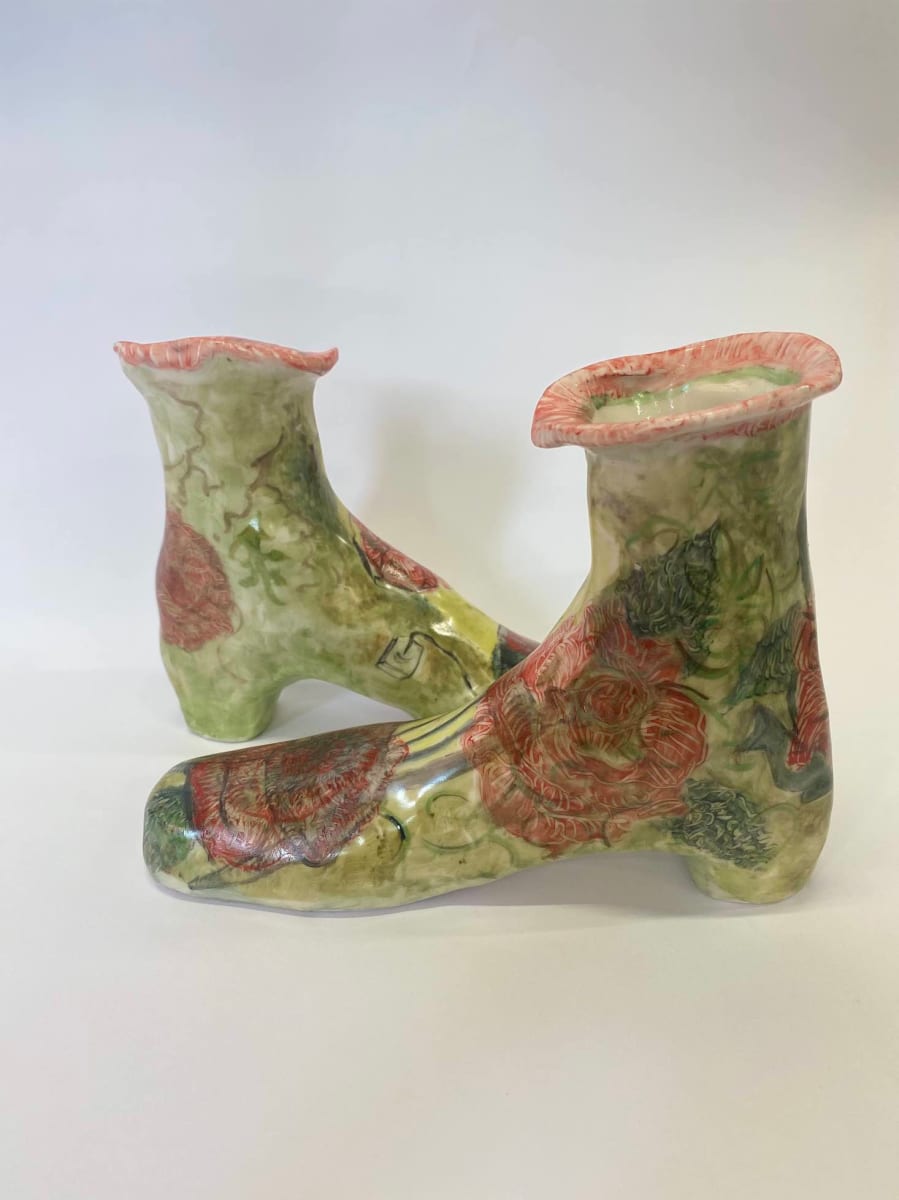 Rose Shoes by annekwasner@gmail.com  Image: Roses painted on slip cast shoes with onglaze, several firings. Up-cycled previous work with domestic images on it. 