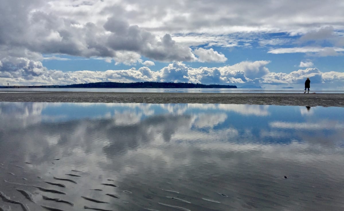 Lady on the Bay  Image: Reflection on East Beach in White Rock BC
