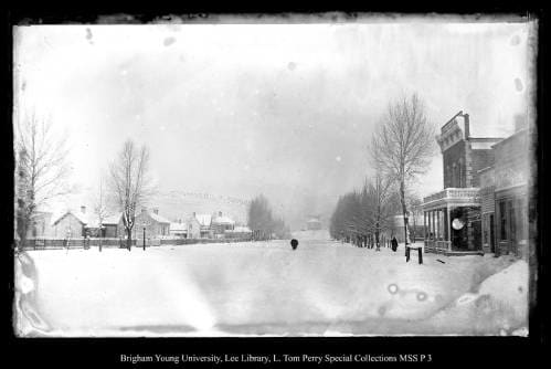 [Coalville] by George Beard  Image: A person and an animal on a snow-covered city street.