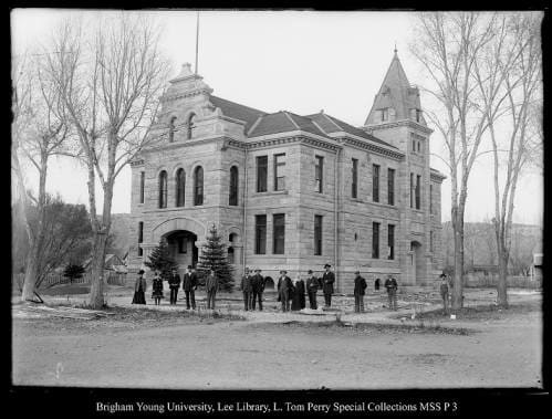 [The New Summit County Courthouse Upon Completion] by George Beard  Image: Women and men standing in front of a brick building.