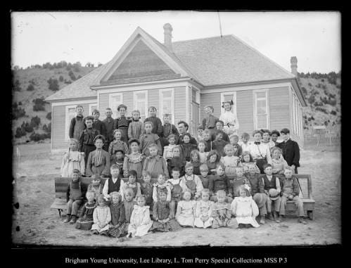 [Coalville's 2 room Schoolhouse; 2 Teachers, 60 Pupils] by George Beard  Image: 	
Group portrait of children and two teachers in front of the school.  Most likely a two room school located in Coalville, but possibly in Upton.