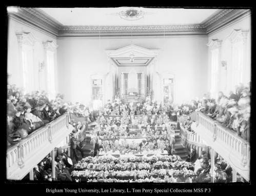 [Funeral Services for Coalville victims of the Scofield Mine disaster of May 1, 1900, held in the Coalville Tabernacle; B. H. Roberts spoke] by George Beard  Image: People gathered in tabernacle listening to speaker.