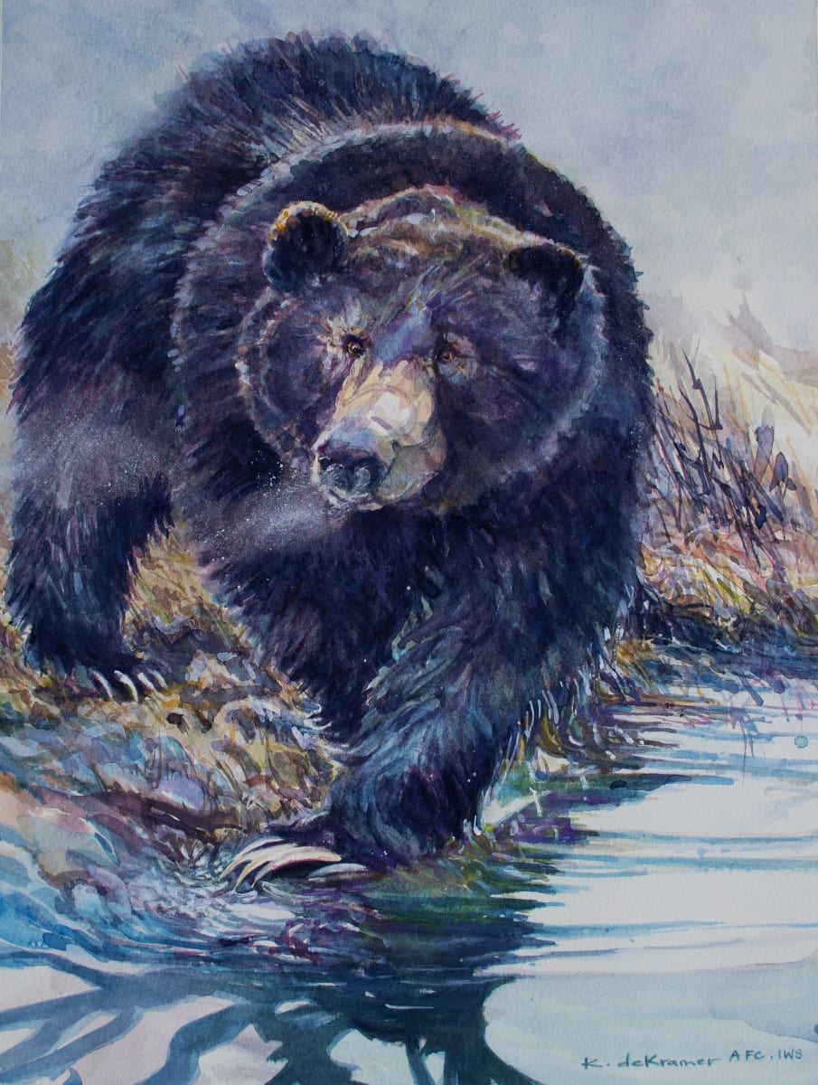 Wary Grizzly by Karyn deKramer  Image: The Grizzly emerges from the fog in early morning light to the bank of a frozen pond. The bear can smell a frozen carcass below the depths of ice. He wants this prize for himself and is wary of others who might try to challenge the possession of this meal. In the creation of 'Wary Grizzly', I built up many layers of transparent watercolor creating the powerful beast of bear. Large claws distinguish the power of this predator. 