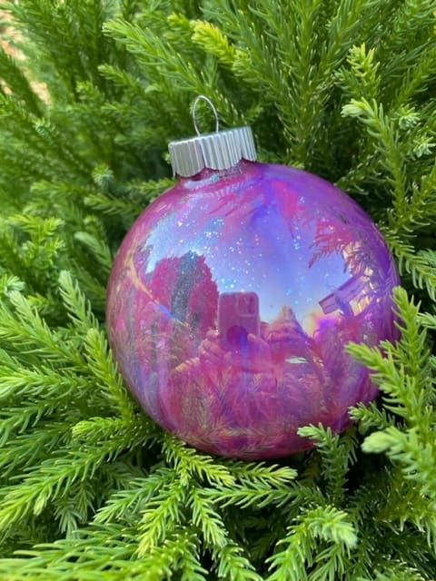 Celebration Collection #12 by Shannon Juliano  Image: deep rich magentas and purples and sparkles on an iridescent glass globe
