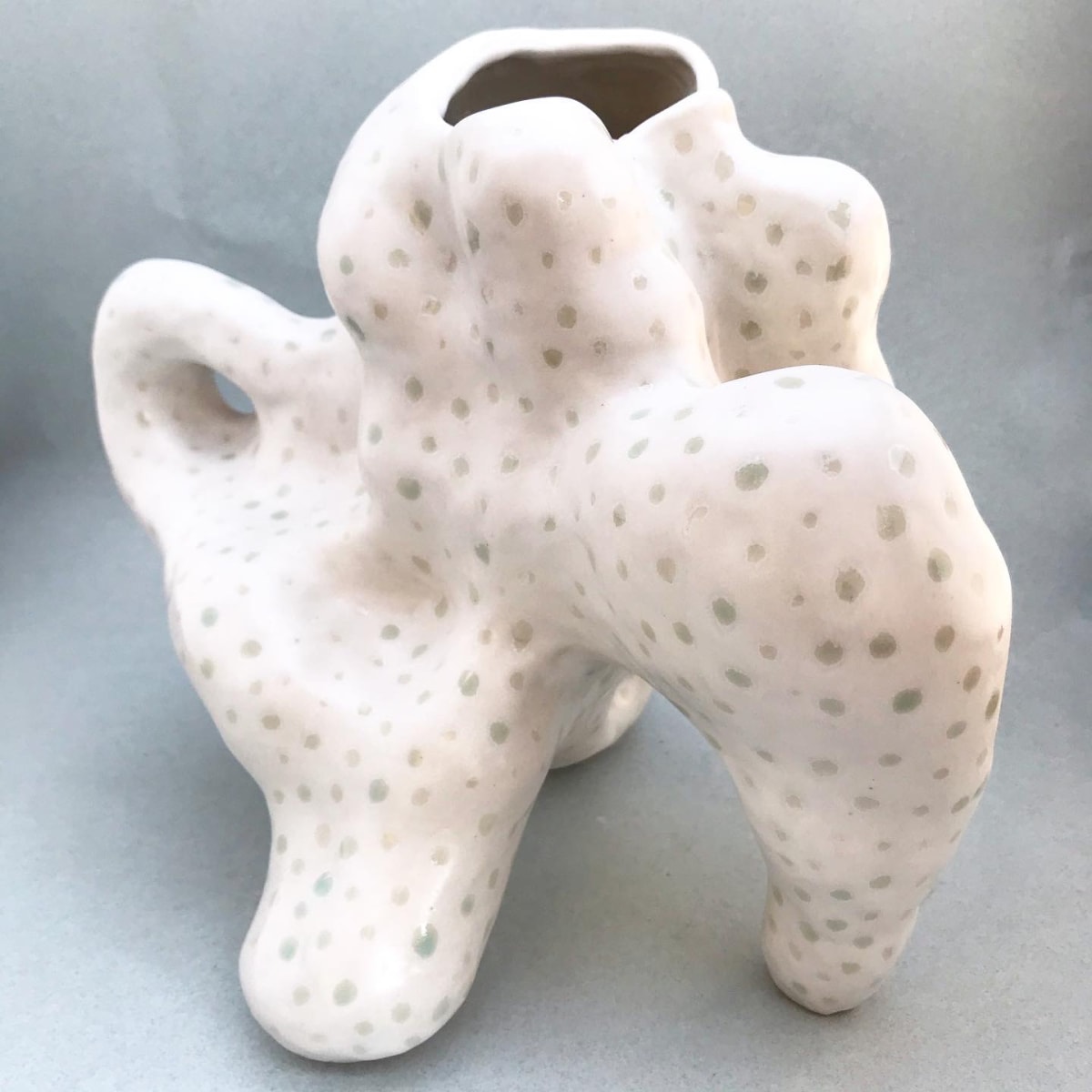 white vessel with aqua specks by Kelly Witmer 